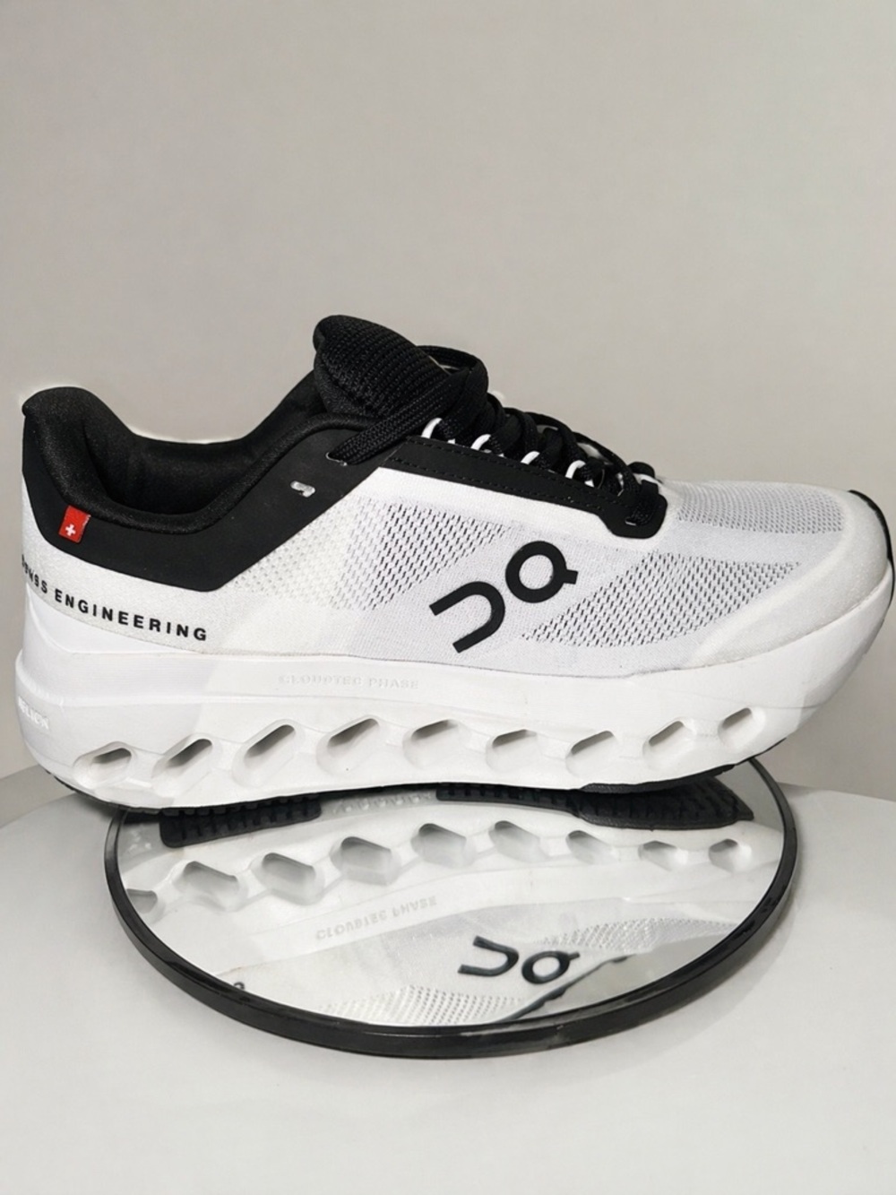 On Running Men’s White and Black Cloud-Inspired Running Shoe